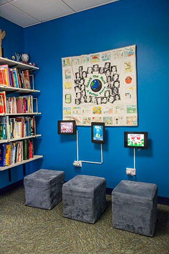 Ipad wall - Pediatric Dentist serving Logan Square, IL