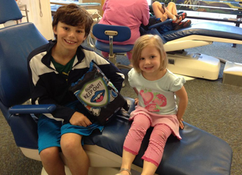 Children in dental chair - Pediatric Dentist serving Chicago and Lincoln Park, IL